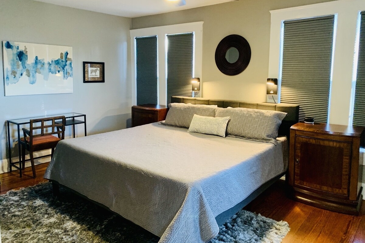 The master bedroom includes a king bed, large closet, TV and en-suite bathroom. 