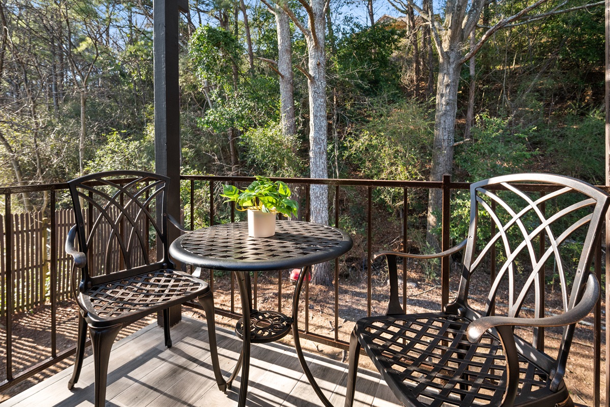 Private covered patio perfect for lazy mornings sipping coffee or late-night chats with loved ones.