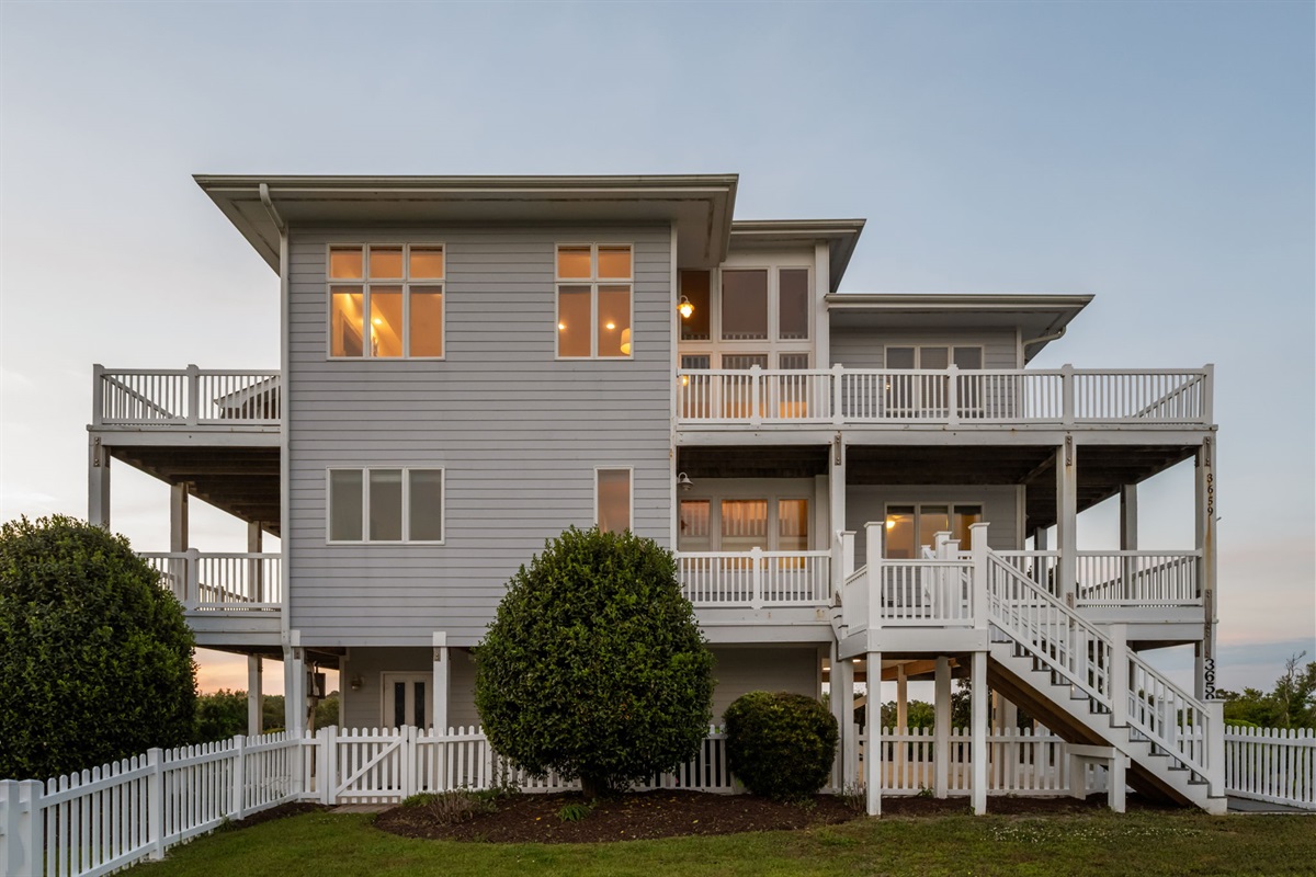 Expansive coastal retreat just steps from the beach with stunning ocean and marsh views