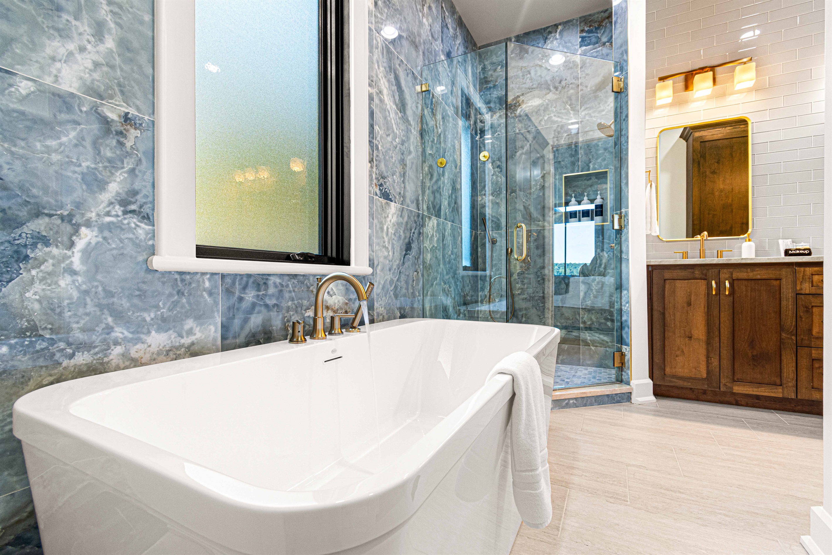 Primary Bedroom on suite free standing bathtub and shower