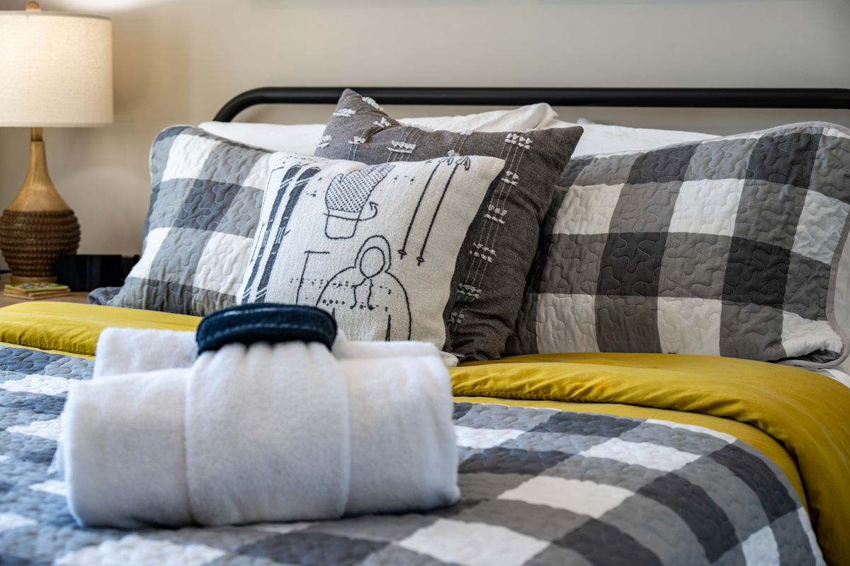 Sink into the cozy king bed with premium linens and thoughtful touches designed for a restful night's sleep.