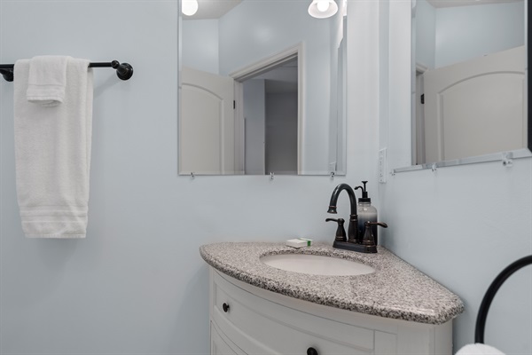 Bathroom vanity in convenient main level ensuite.