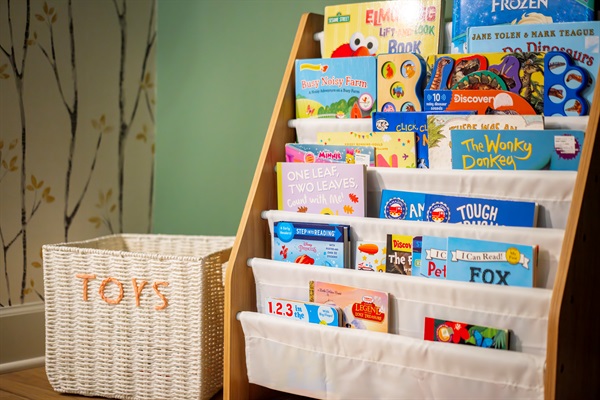 This secret, kid size "hideaway" is equipped with children's books and a few toys for your littlest adventurer's to explore. 