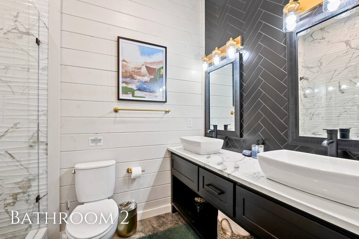 Double vanities and plenty of counter space make getting everyone ready in the morning simple and stress free.