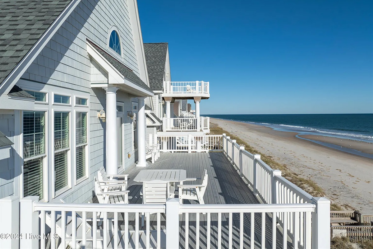 Expansive outdoor living space perfect for morning coffee or sunset drinks