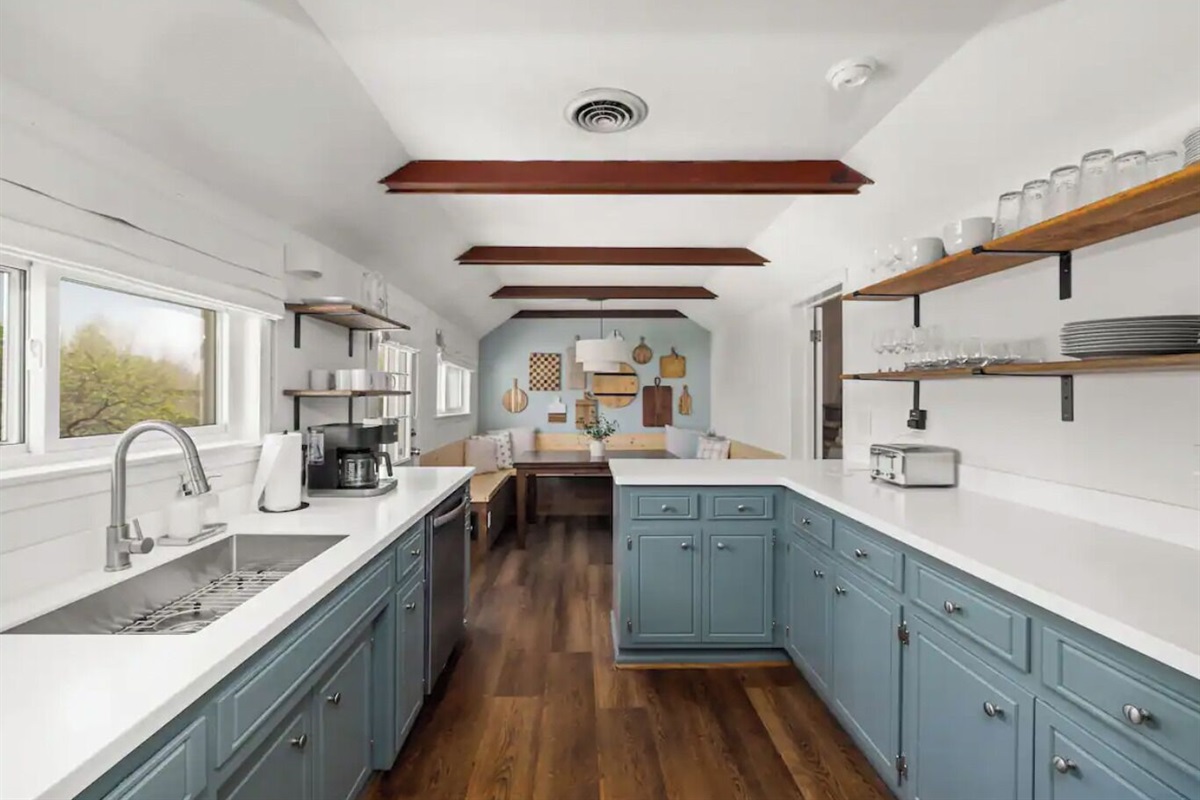 The kitchen and breakfast nook overlook the back patio and oversized yard.