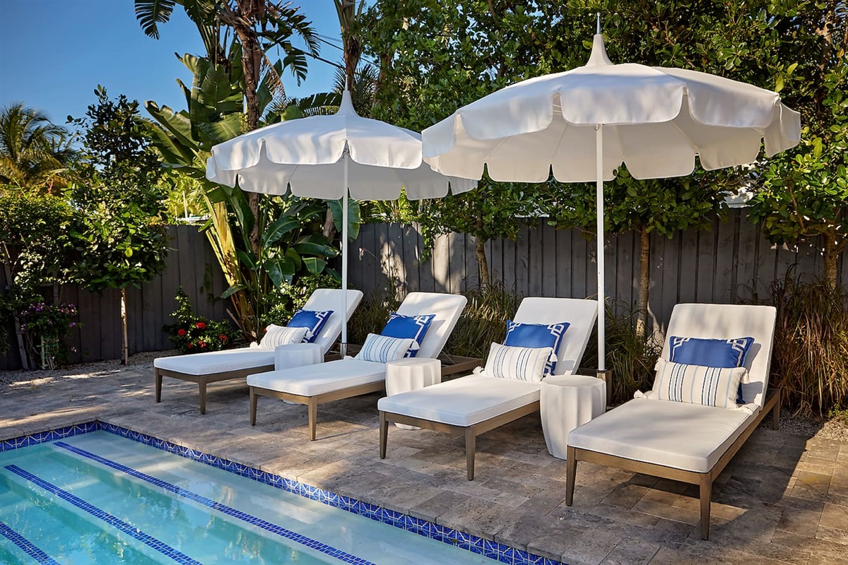 Enjoy relaxing on ultra-comfortable lounge chairs surrounded by lush tropical landscaping and a stunning pool and spa.