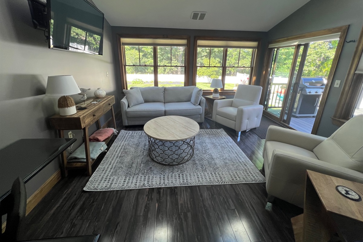 Bright sunroom off of the kitchen