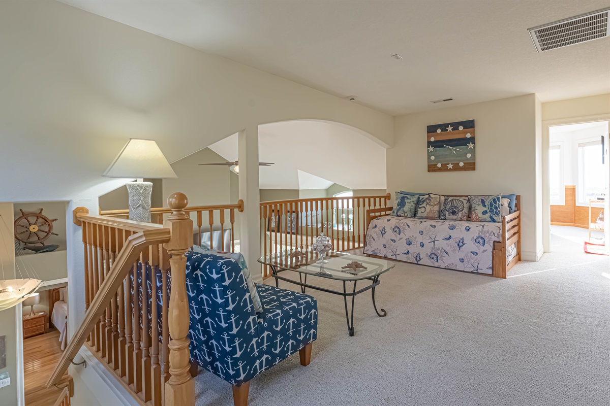 3rd floor (top floor) loft is a comfortable spot to cozy up and take a break.
