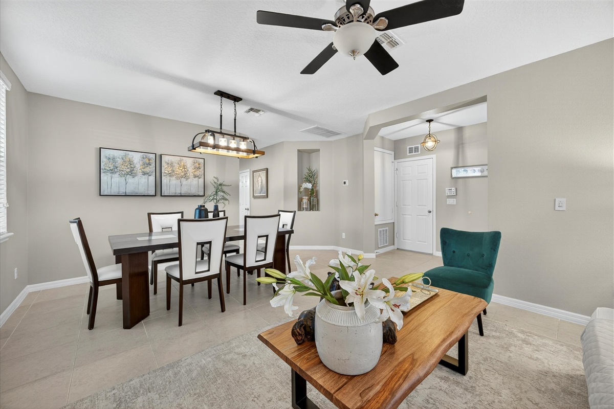Open dining and living area perfect for gathering and enjoying home-cooked meals.