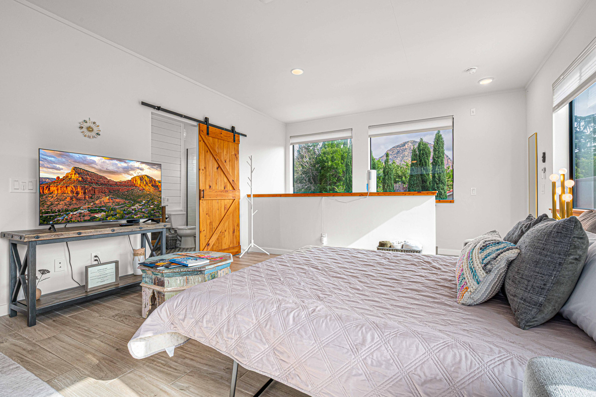 {Queen Sleeper} Host additional guests in the casita’s king bedroom with TV plus additional Queen sleeper for extra sleeping space. 