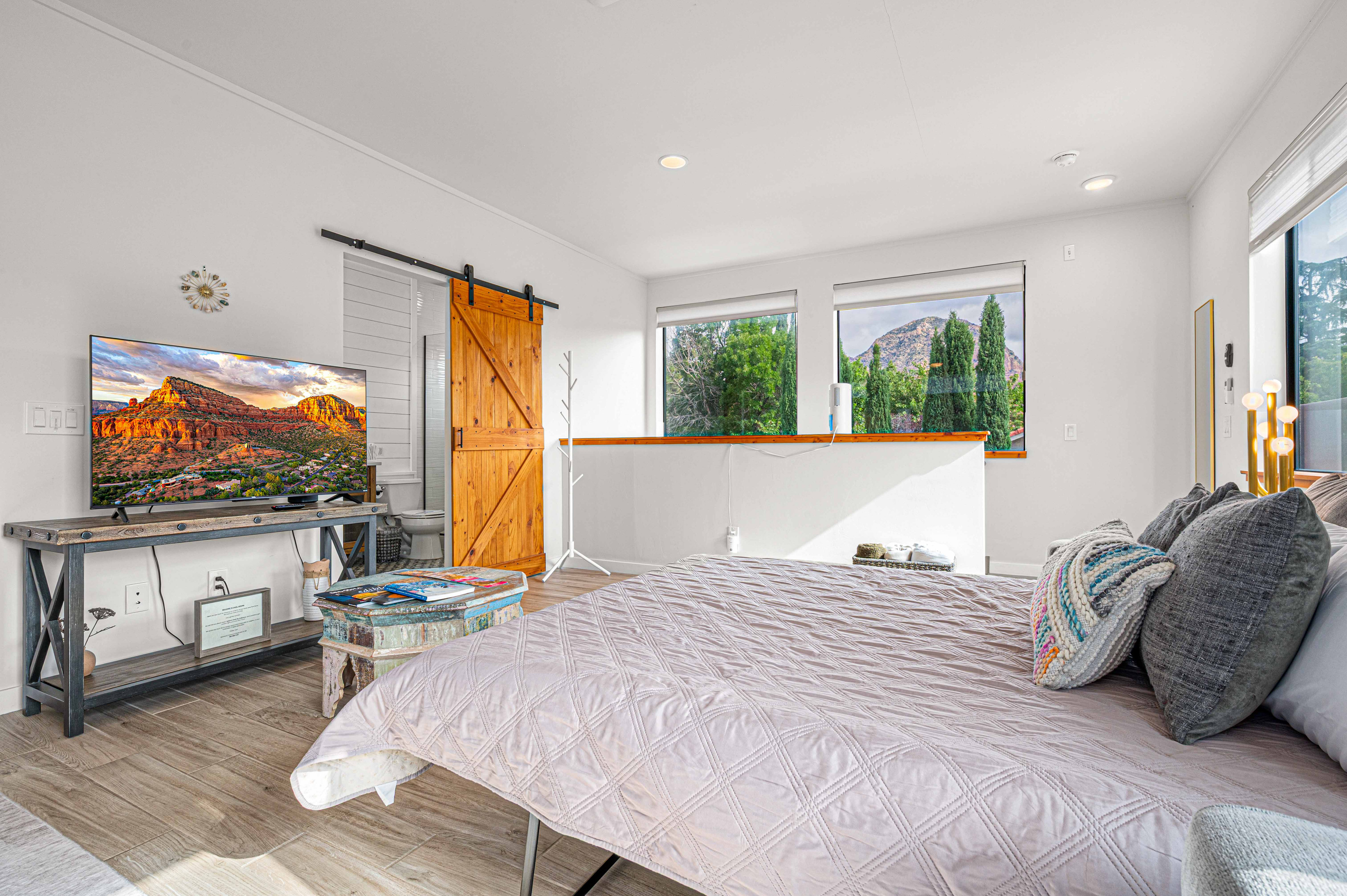 {Queen Sleeper} Host additional guests in the casita’s king bedroom with TV plus additional Queen sleeper for extra sleeping space. 