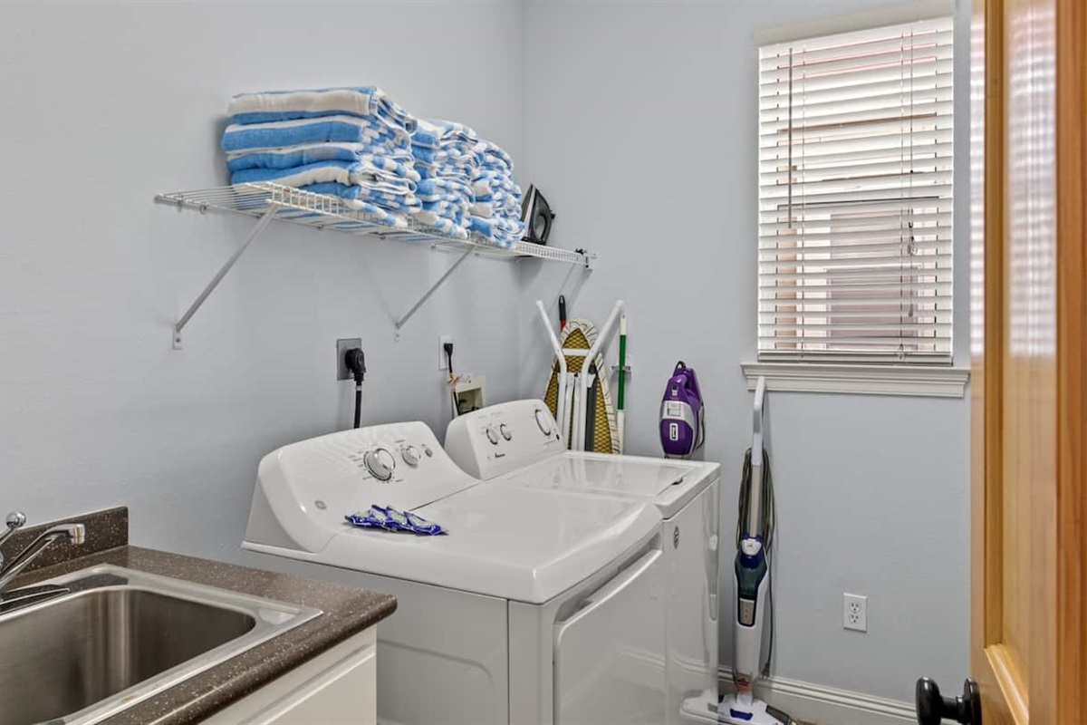 A full laundry room on the first floor and we supply the pool and beach towels. Pack less, enjoy more.