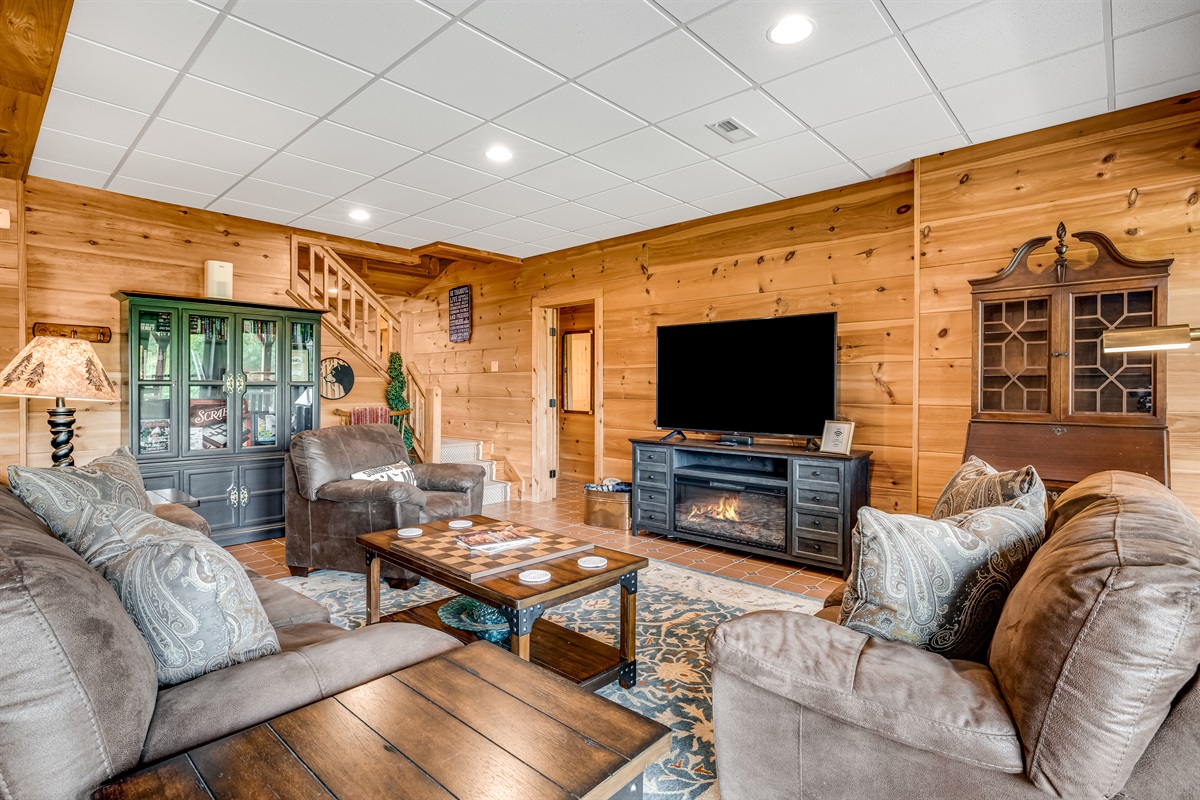 Lower level living area with a TV