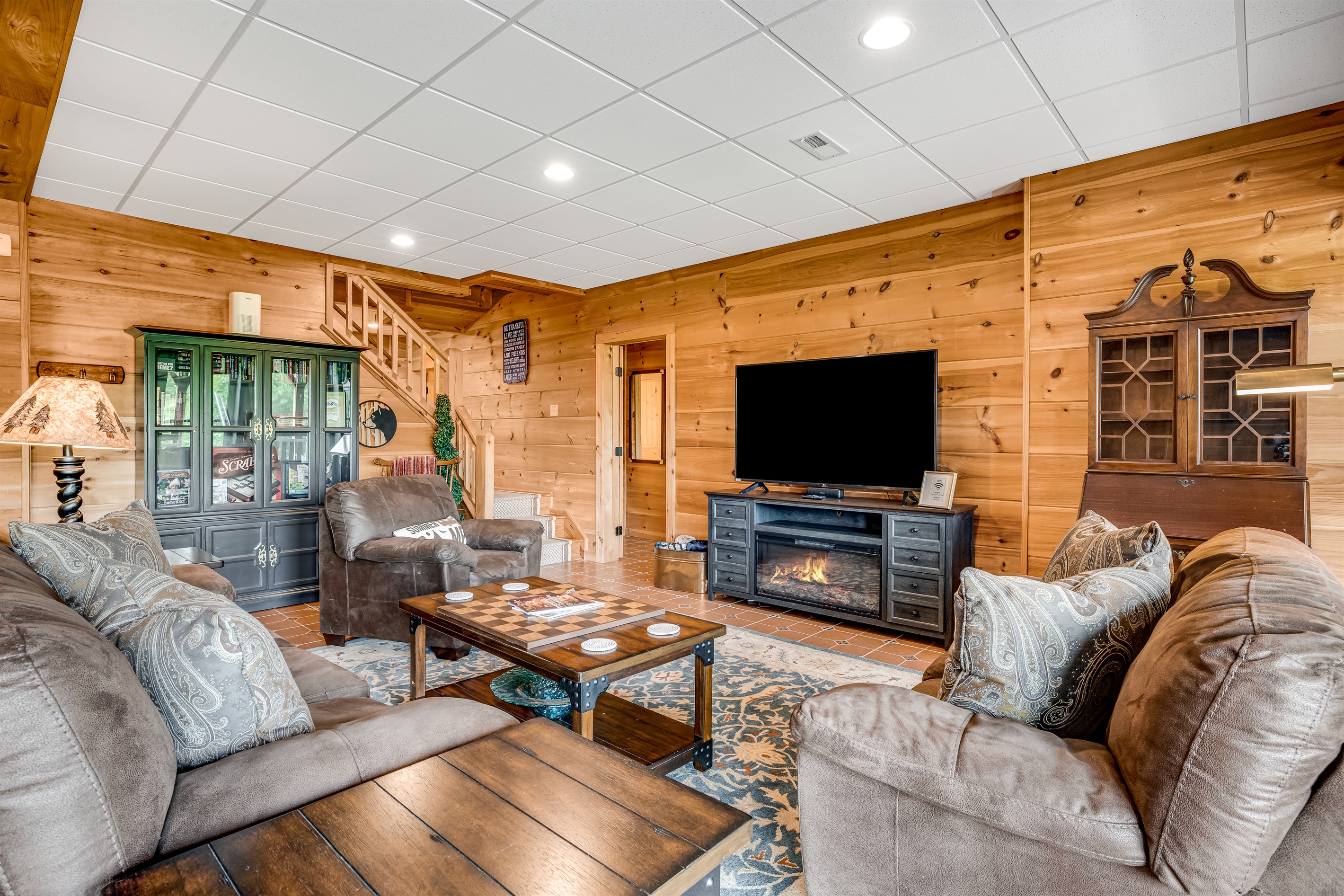 Lower level living area with a TV