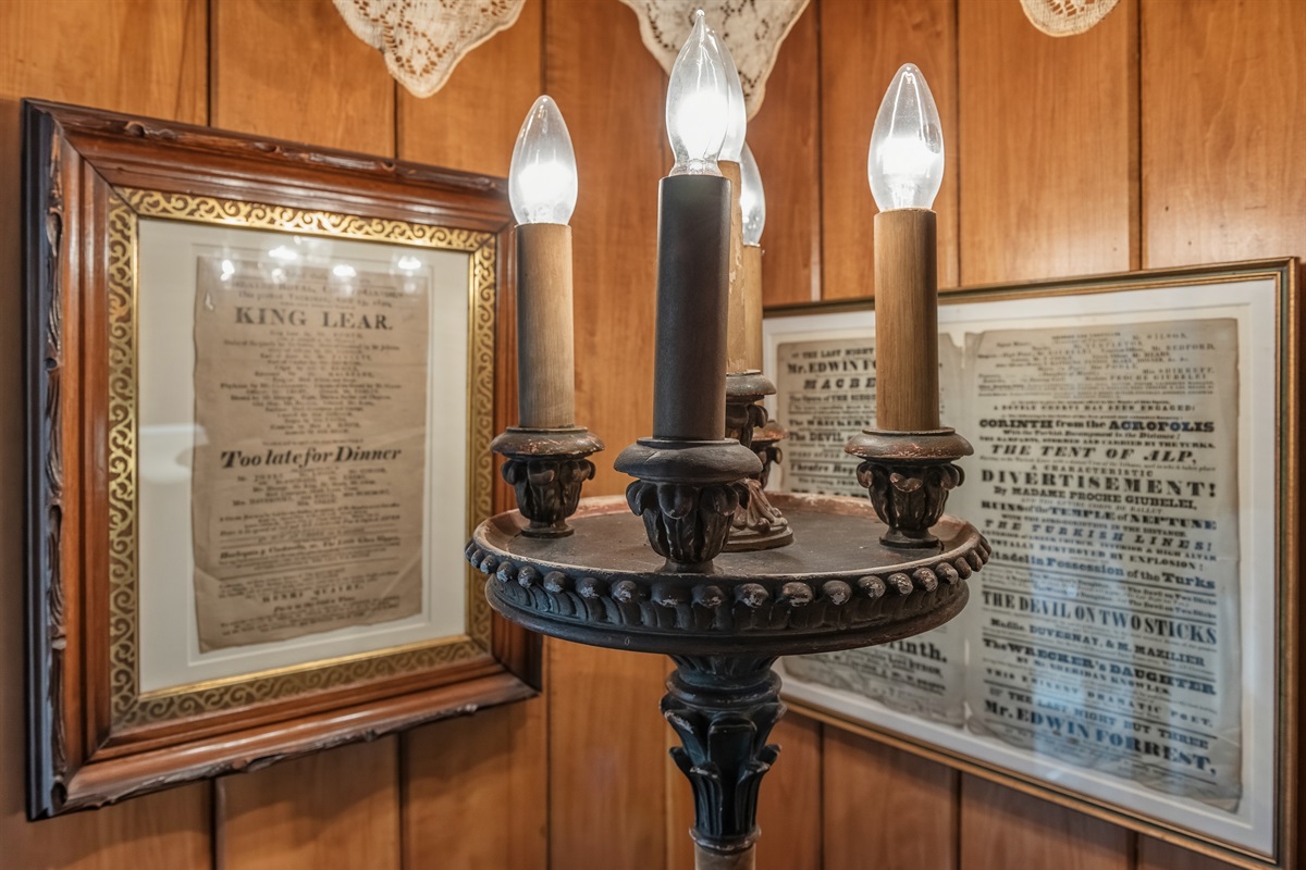 Decorative display w/ vintage pieces & soft ambient lighting