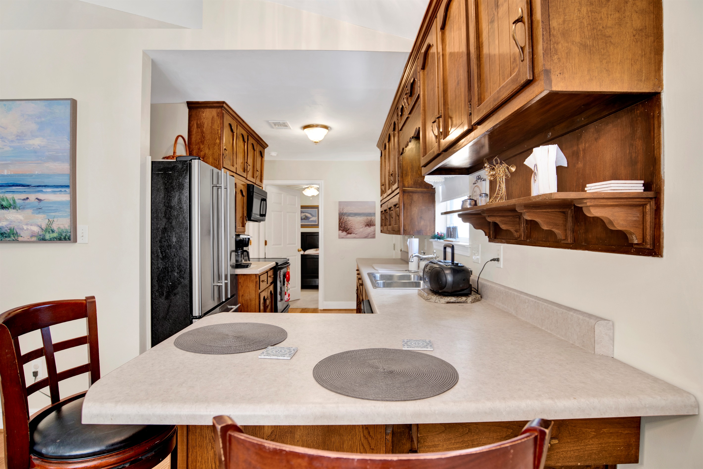 Spacious counters and bar seating for 2