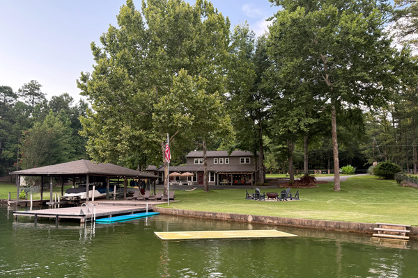 3,000 SF house on 1.25 acres with fenced yard, private dock and plenty of parking
