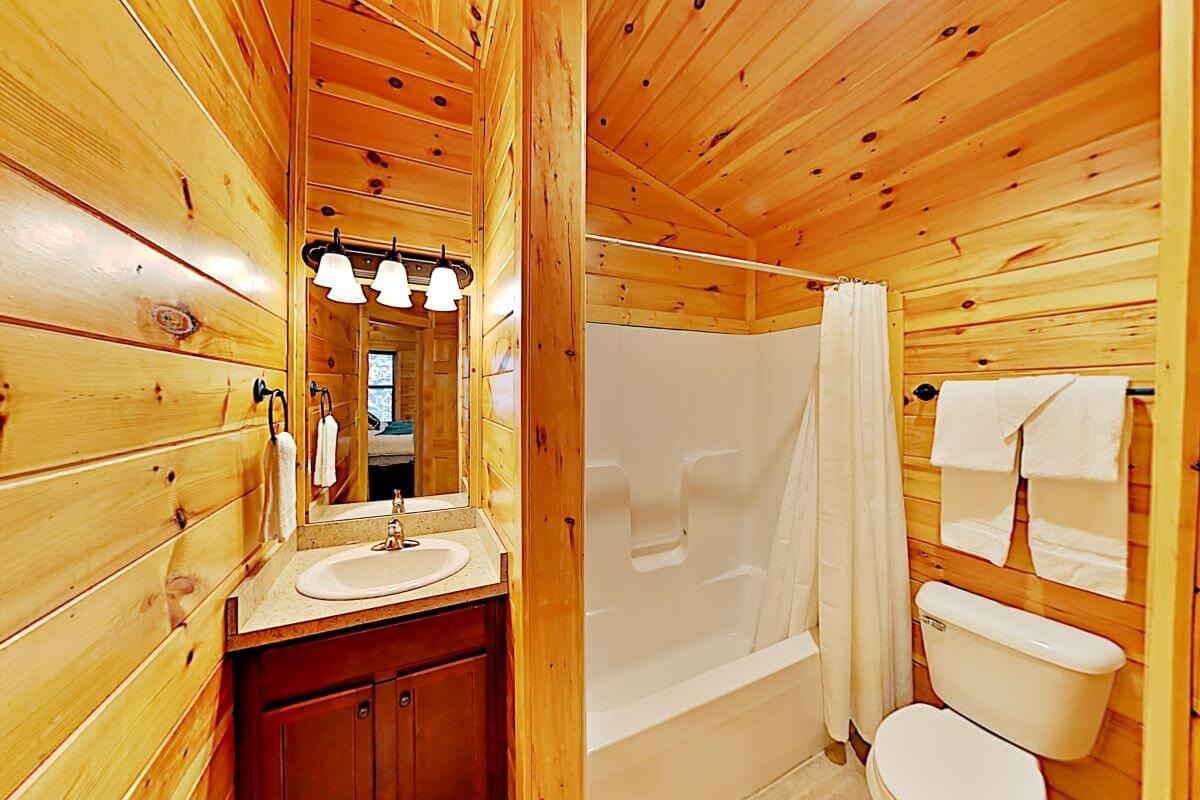 The vanity area is a small space with little elbow room but provides enough space for one person at a time.