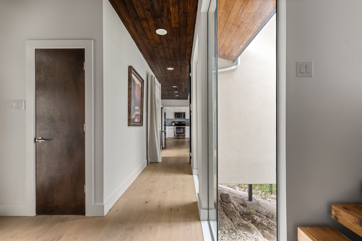Light-filled hallway with modern finishes