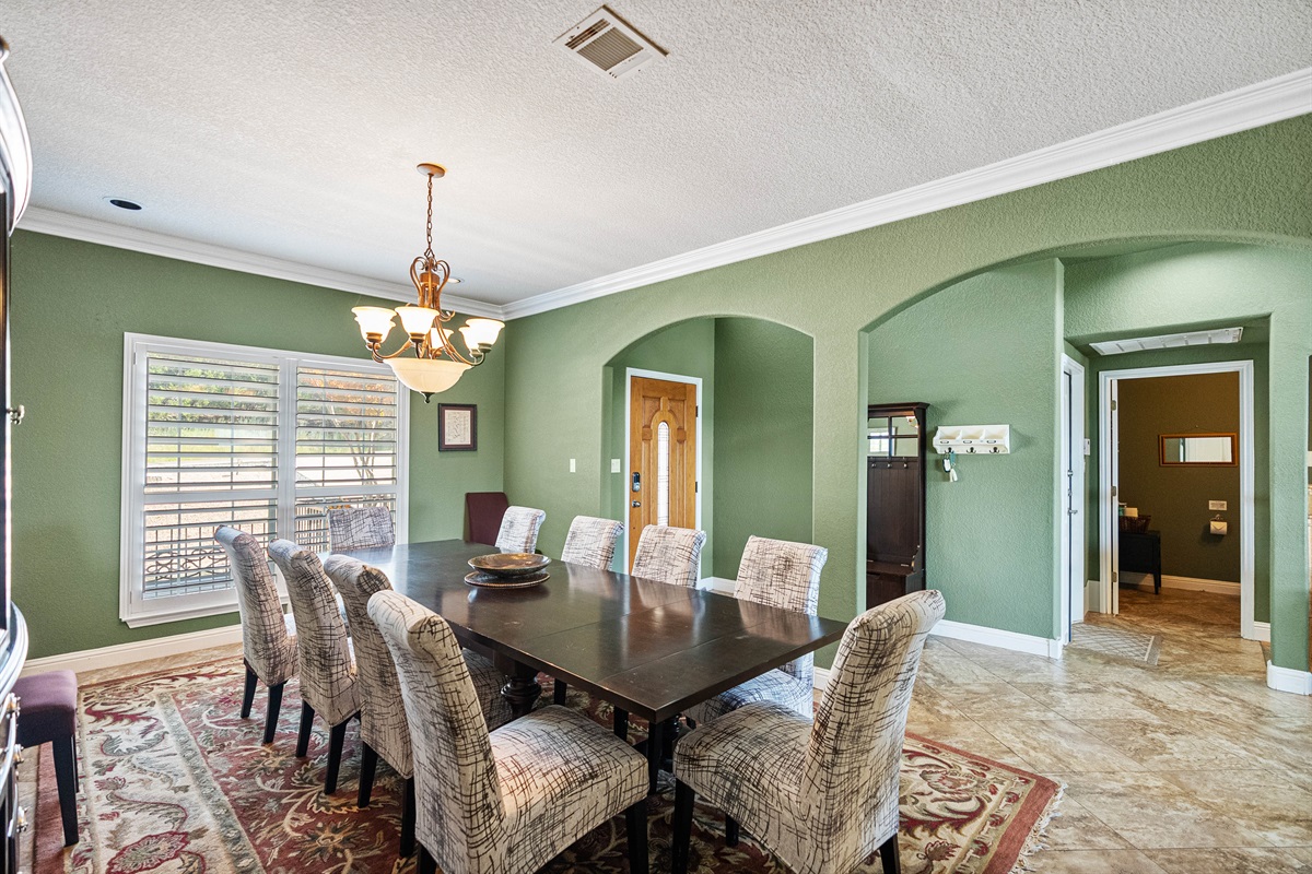 Spacious dining area with seating for 10, perfect for family meals and group gatherings.