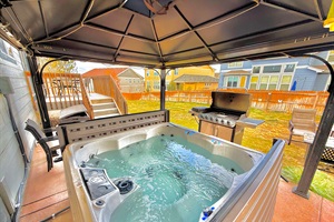 Unwind in the private hot tub under the covered patio. Perfect for stargazing after a long day.