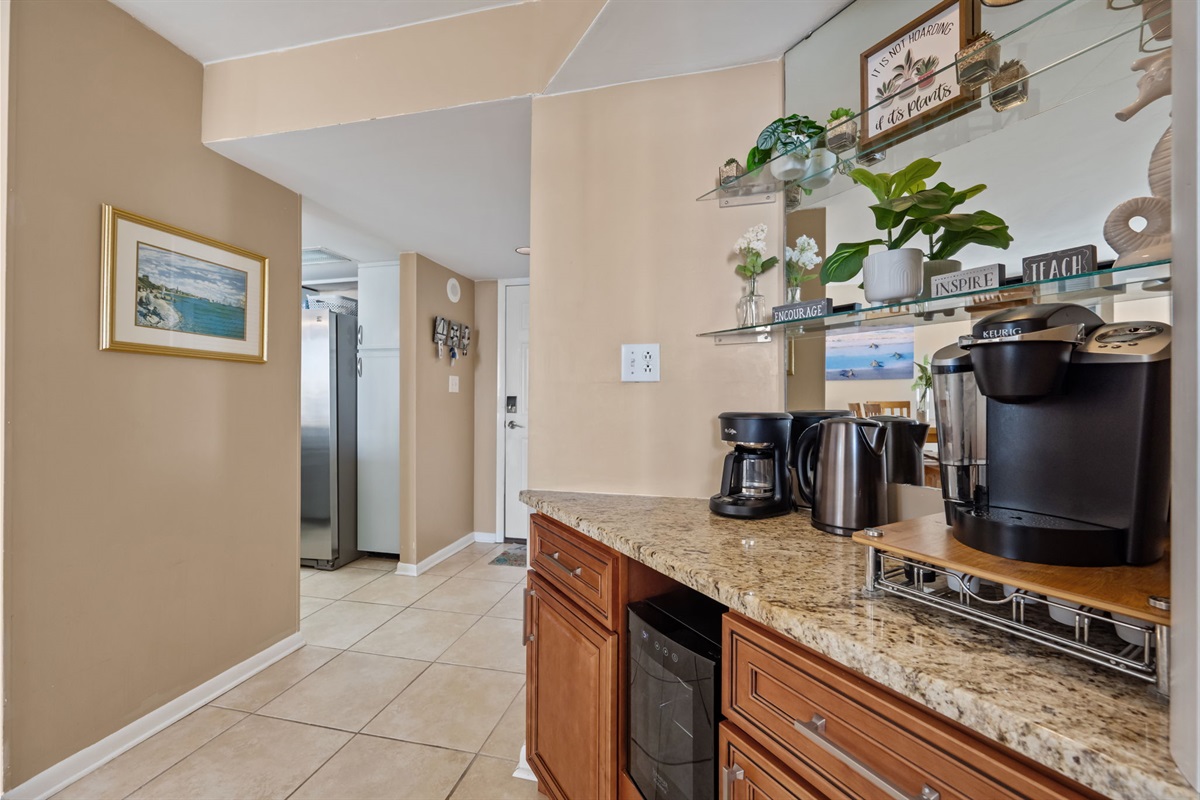 Convenient coffee and beverage station with Keurig, drip coffee maker, electric kettle, and extra counter space for easy mornings
