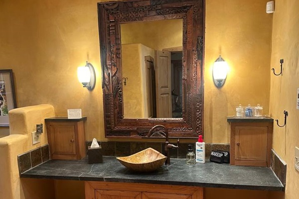 Bedroom two bathroom, single vanity and walk in shower.