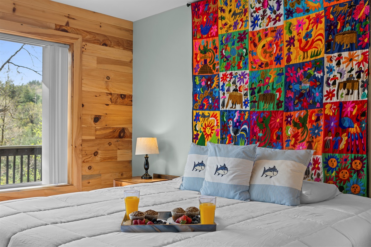 King Bedroom 2: Bright colors and nature views create a vibrant getaway for your adventures!