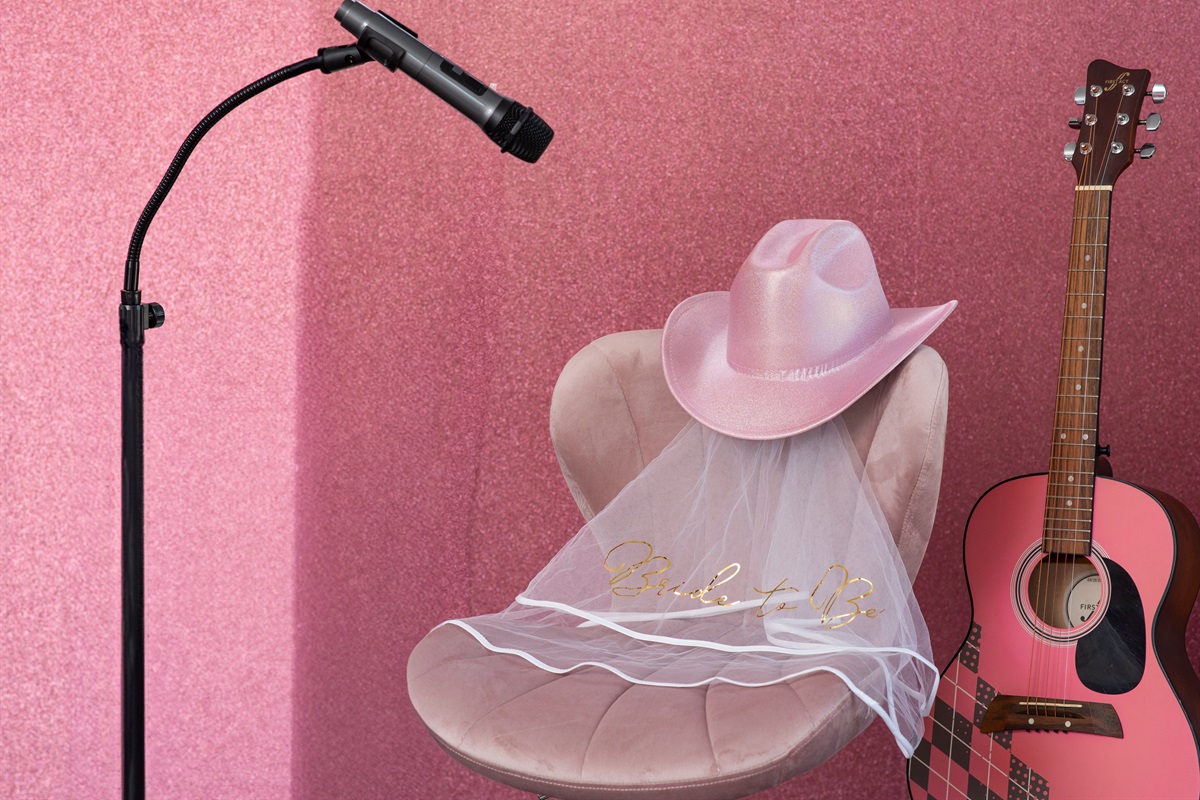 Who doesn't love a pink glitter wall & karaoke!