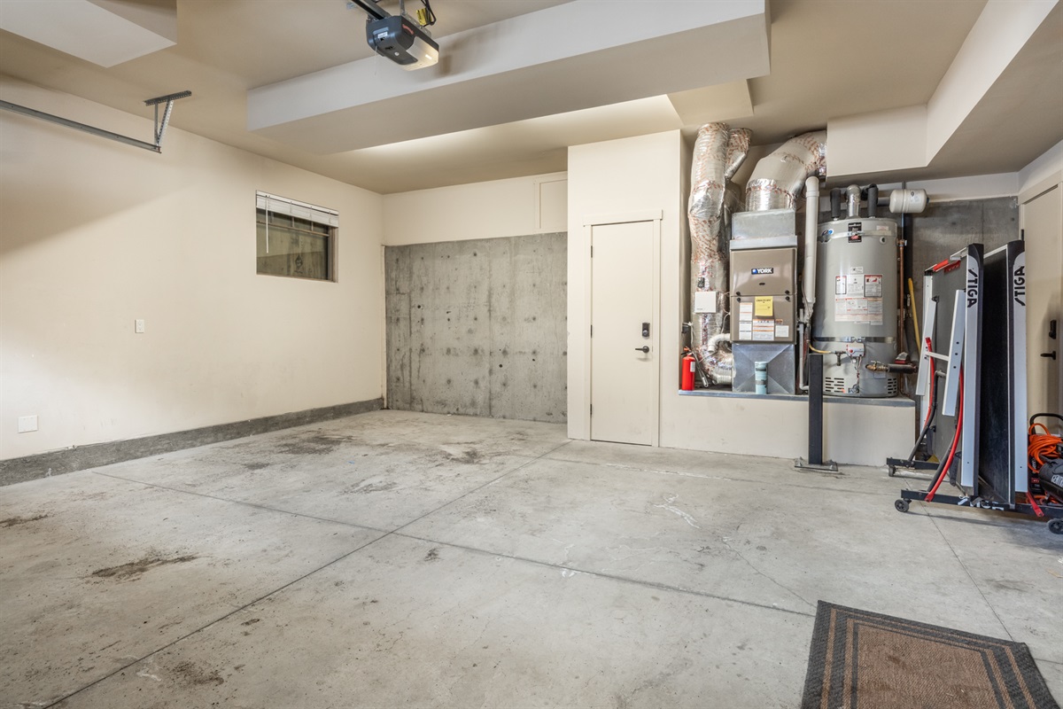 Two private garages provide e-vehicle charging, parking for four vehicles indoors (in addition to up to 4 outdoor space), a boot warmer, and tons of storage to make ski days easier.