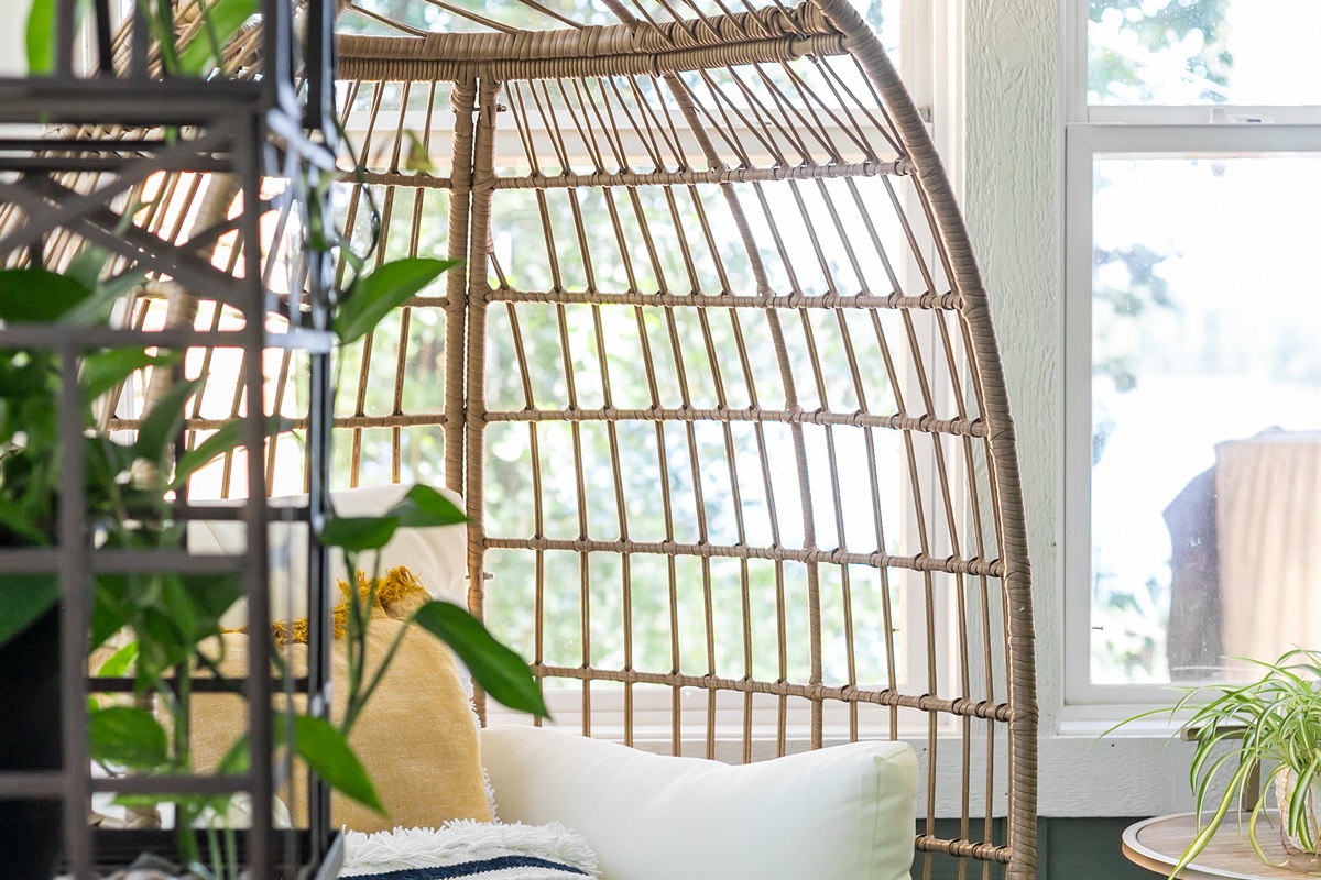 Whether it’s a rainy afternoon or a sunny morning, the egg chair in the sunroom offers the perfect nook to relax or get lost in a good read.