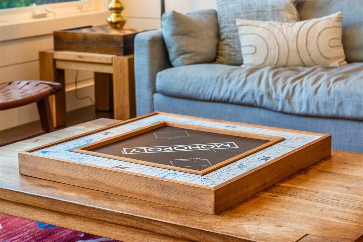 Game night guaranteed with Monopoly on deck in the cozy living area.