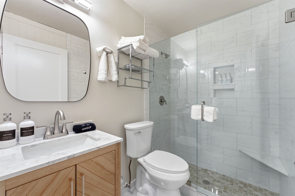 Clean tile, simple lines, and a real shower make getting ready fast.