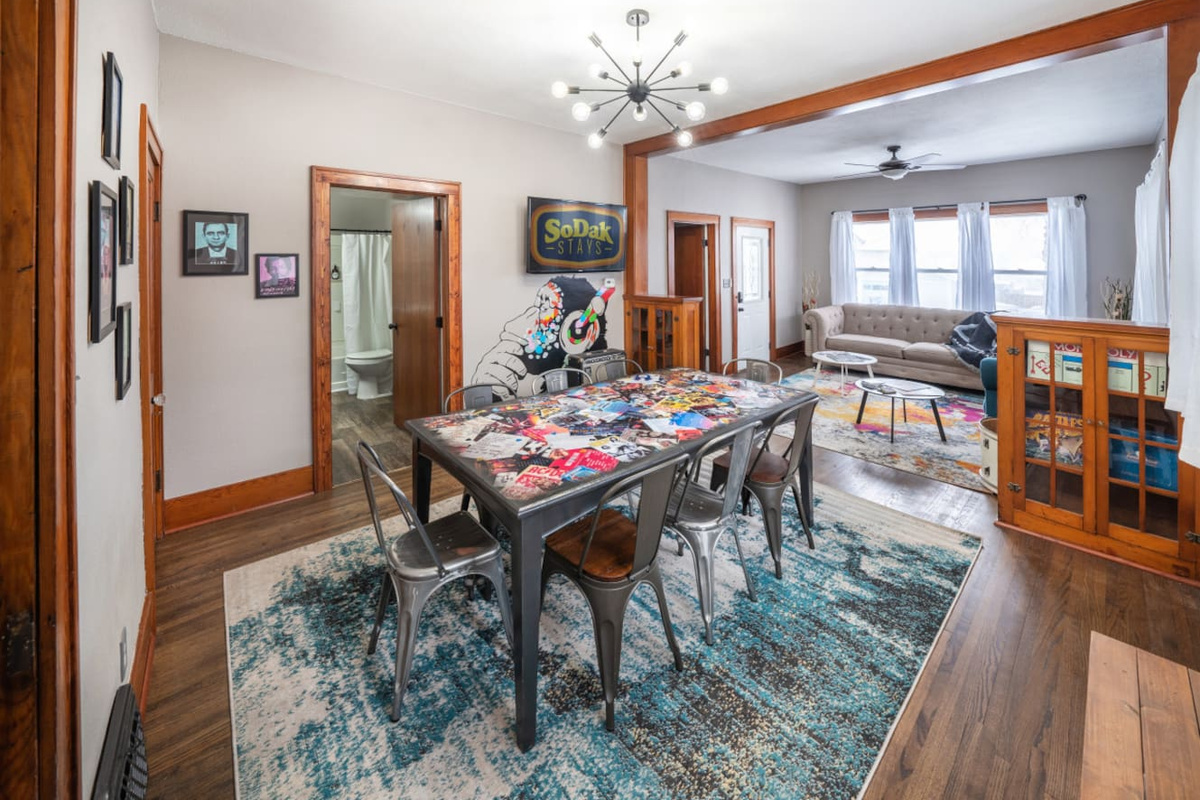 The TV swivels so you can watch it either in the living room or dining room.