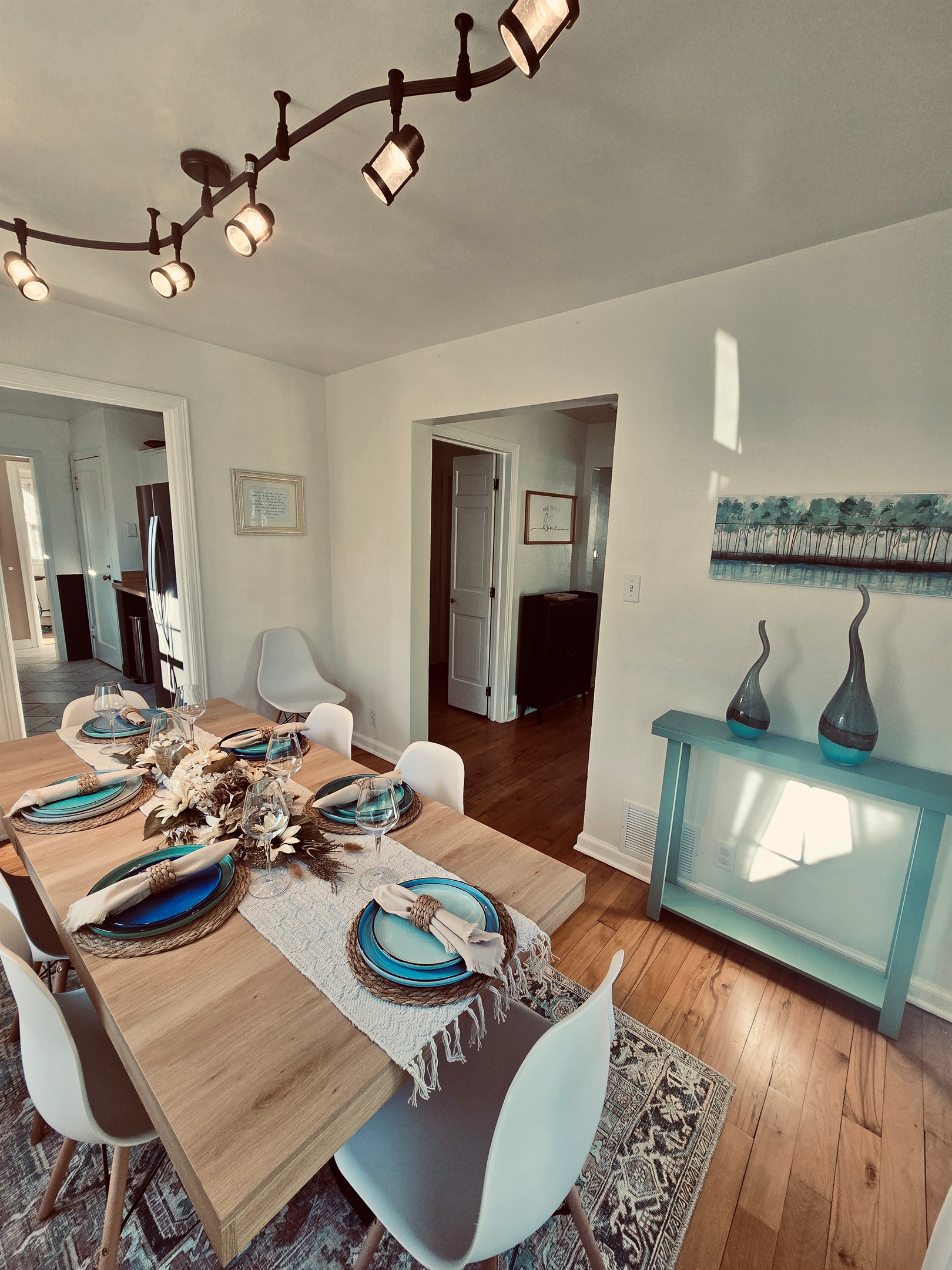 Style from the ground up—beautiful floors and a table made for gathering.