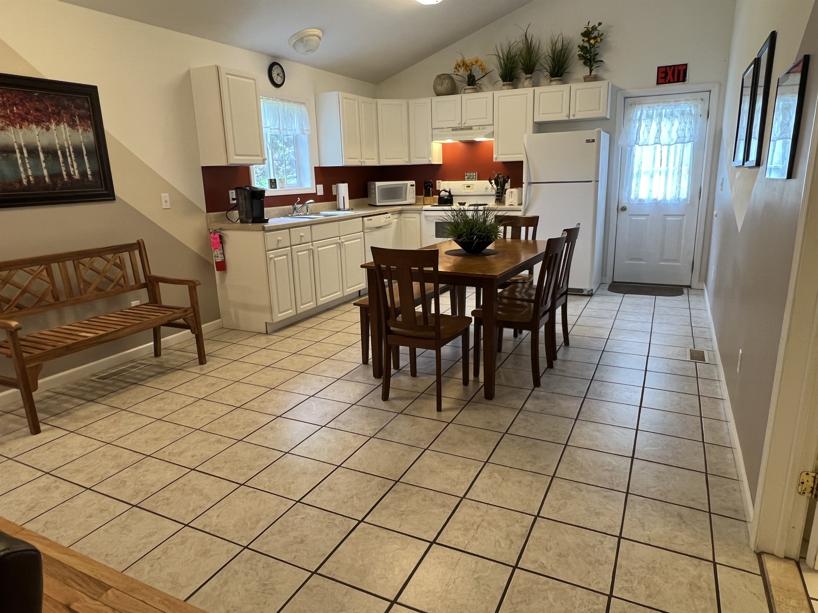 The Federal House Apartment 1 eat-in kitchen with plenty of space and everything you need to make a meal expect the food.