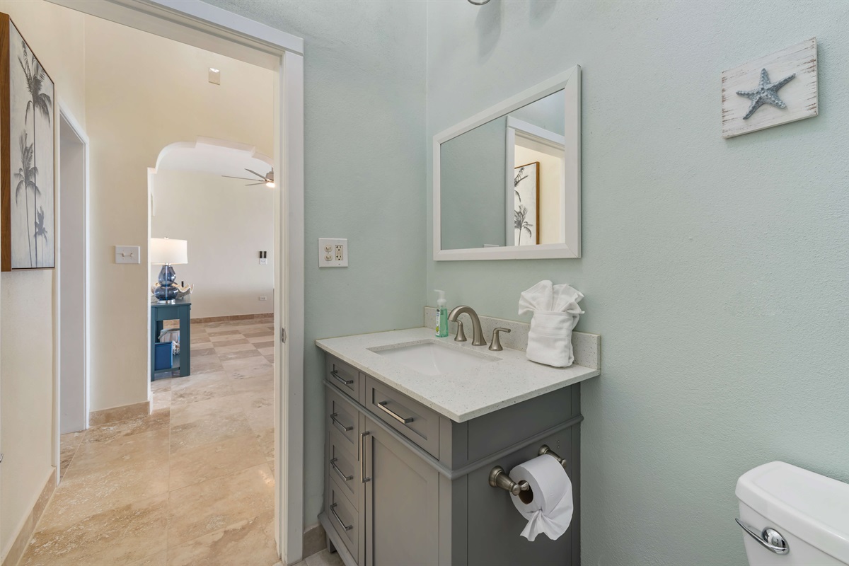 Compact laundry space with modern appliances for guest use.