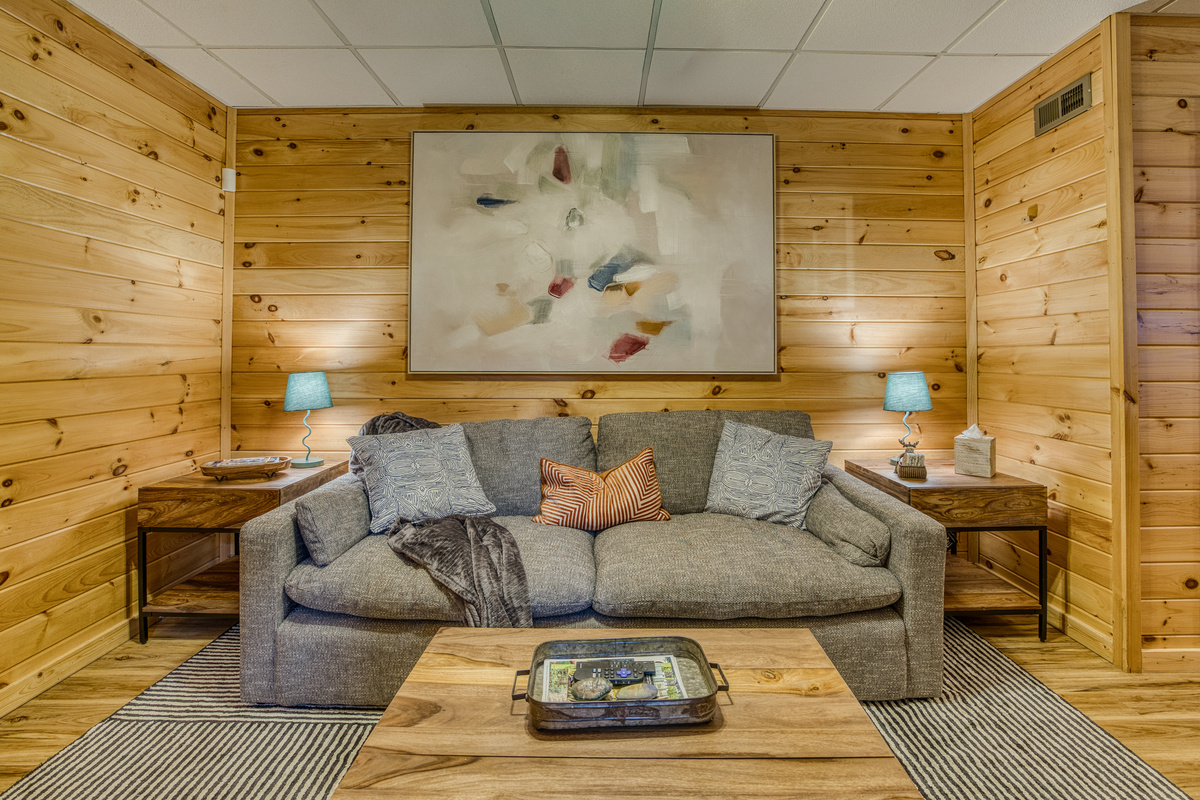 Cozy sofa area with artwork.