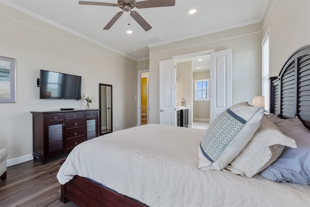 Master Bedroom #1: Lot's of natural light with a TV and sound system for relaxing in the evenings.