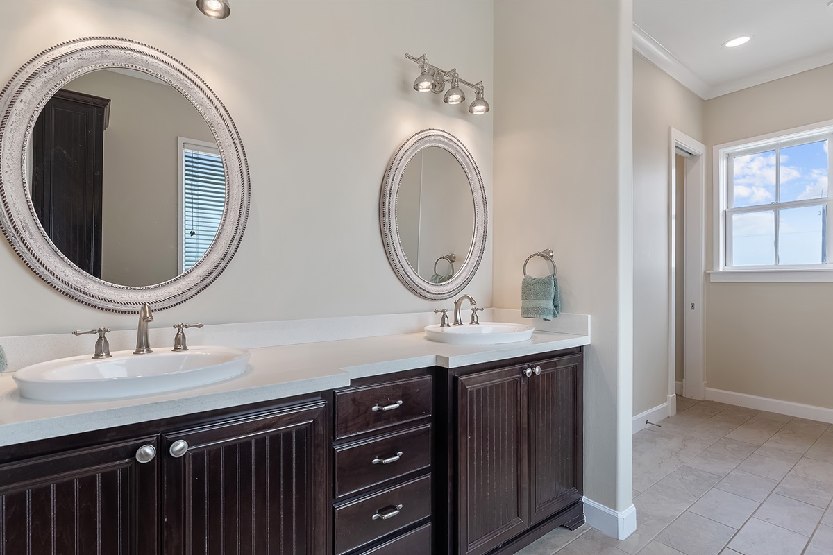 Master Bathroom #1: Elegant double sink with marble counter.