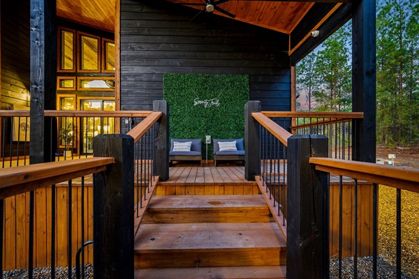 Strike a pose at the custom Serenity greenery wall on our designer sunset deck.