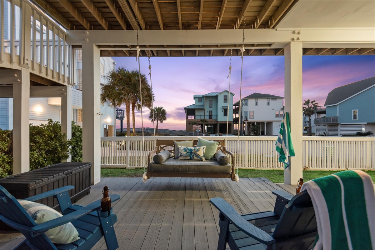 Settle into the porch swing for a perfect blend of rest and relaxation, with gentle sea breezes all around.
