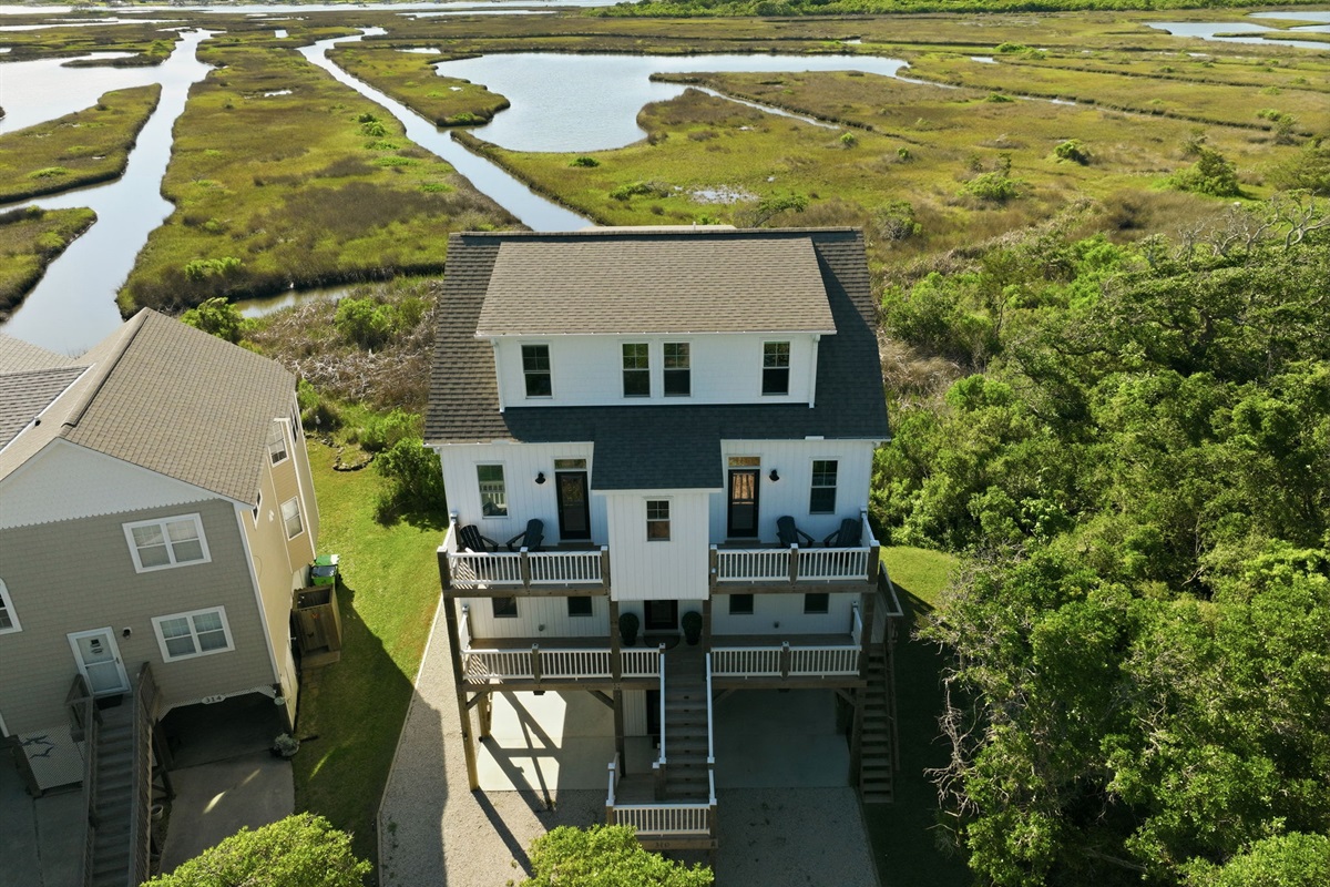 Tucked beside scenic marshlands with peaceful water views all around