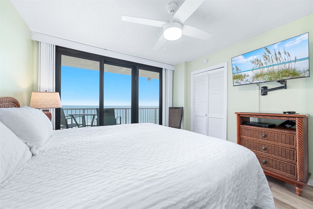 Step out onto your private balcony and enjoy the fresh sea air. This bedroom features a comfortable KING bed and a flat-screen TV for your enjoyment.