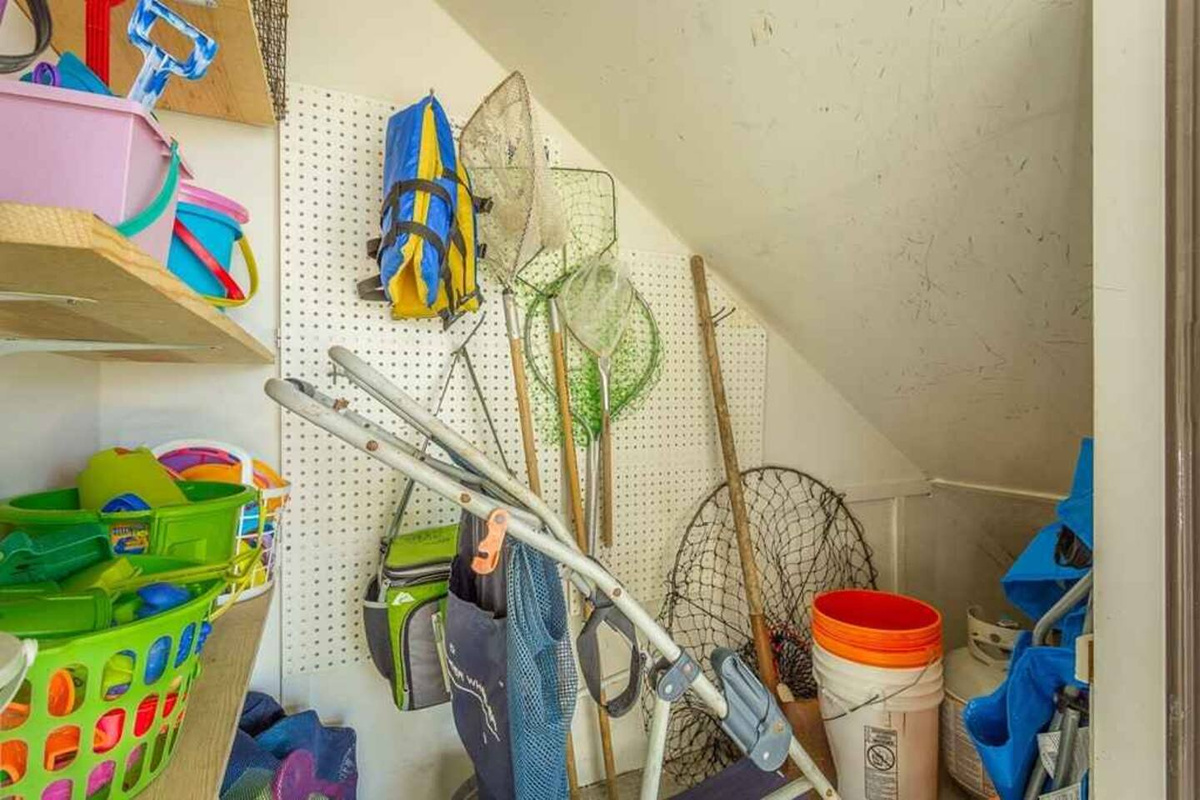 Your stocked beach closet is loaded and ready &mdash; pull the door open and pick your gear before the rest of the crew is up.