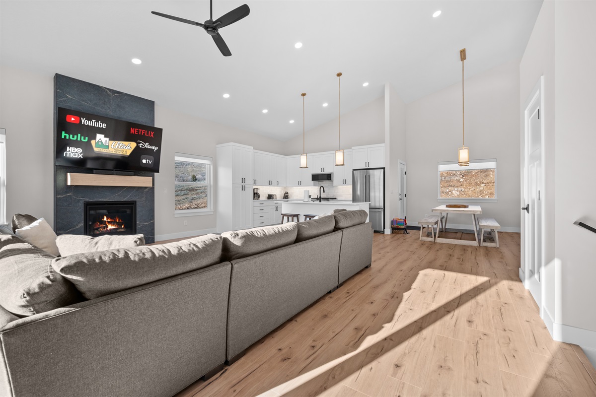 Open floor plan connecting living, dining, and kitchen areas — ideal for entertaining or relaxing.