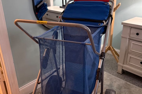 Beach days made easy! This rolling beach cart includes a built-in cooler plus room for chairs, towels, and toys. Big sand-friendly wheels and mesh storage, because carrying everything is overrated.