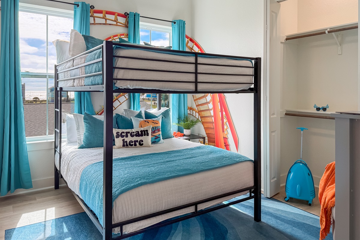 This bunk room also comes with a Queen over Queen bunk bed.