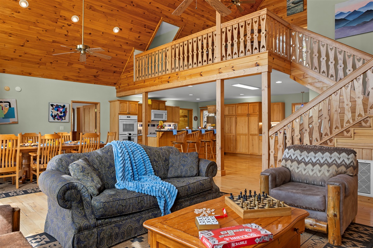Living Area: Enjoy open spaces, vibrant decor, and games in this inviting gathering area!